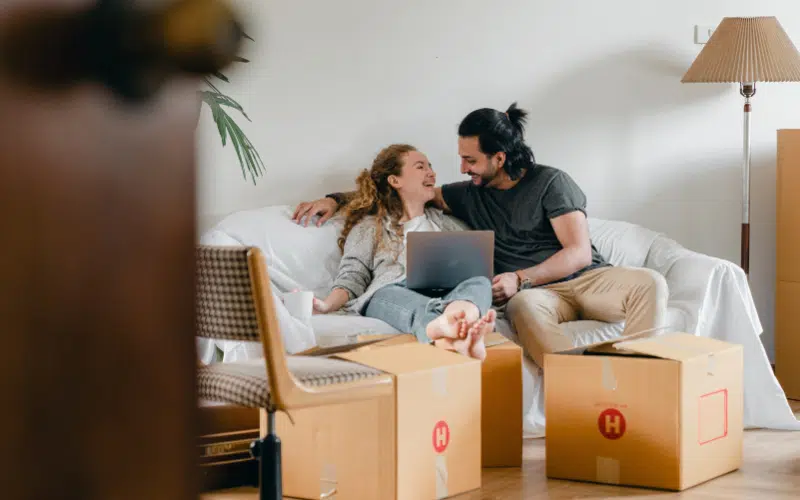 First-time buyer couple discussing the mortgage application process